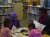 Teacher facilitates a Mini-IMANI reading circle.