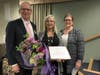 Fallon (center) is recognized by Jefferson’s Ferry President and CEO Bob Caulfield and Vice President of Residential Life Linda Kolakowski during a ceremony at the Life Plan Community.