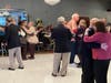 Reading seniors took to the dance floor of the Hillview Country Club at the annual Thanksgiving Dinner in 2023.