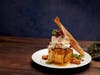 Bananas Foster Bread Pudding, a seasonal, shareable favorite from Firebirds Wood Fired Grill.