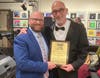 (L-R): LIMEHOF Education Committee Member presents 2024 ‘Educator of Note’ Award to Rocky Point music teacher Craig Knapp. 