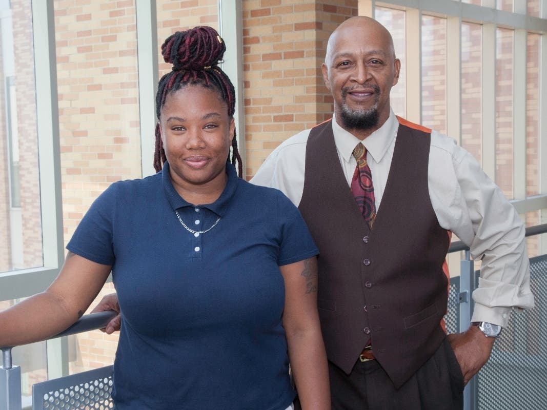 instructor Warren Thomas with CLC student Da‘jah Smith: “Warren Thomas tutored me in every subject for my GED, and a lot of times, I didn’t see what Warren saw in me. I wouldn’t be here without him.”