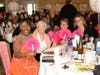 Lucy Christ, Marilyn Mines, Kim Vander Yacht, and Jean Hengesh are waiving their pink fans in celebration of all the children who will attend Kindergarten Countdown Camp this summer.
