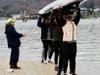 High School Coxswain, Caroline Murphy, managing dock safety