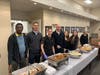 Photo: Metropolitan Capital Bank & Trust team helping serve a Chicago Help Initiative meal. ​Metropolitan Capital Bank & Trust – Corporate Honoree 