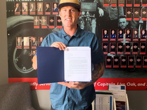 Central Fire Protection District Firefighter Dustin Marty was recognized for his "unwavering service" in a letter of commendation awarded for helping stranded surfers while off-duty.
