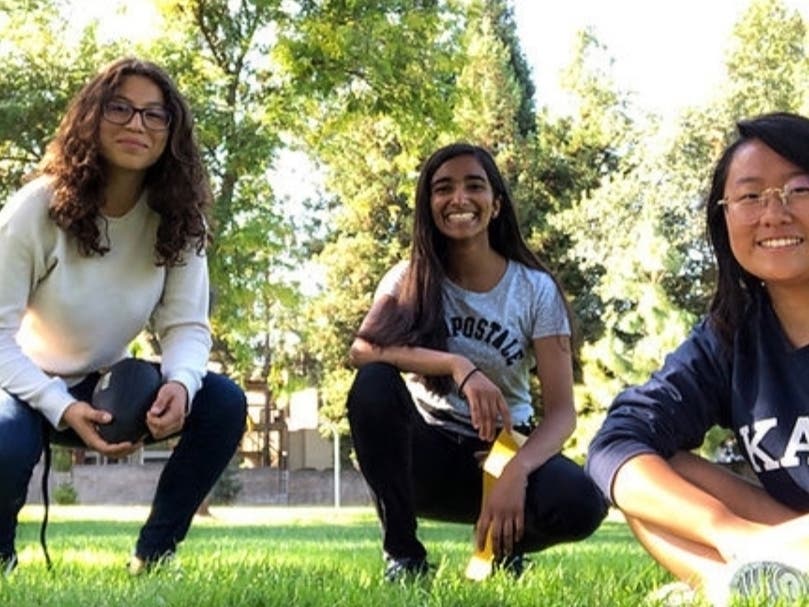 Ana-Paula Pachuca-Rodriguez (left), Shruti Sonekar (center) and Jane Wang are co-founders of nonprofit Football With A Catch.
