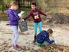 Students tracked the type of debris they collected at Cowell Beach Friday.