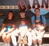 Kenny Yee, then a 4-year-old Make-A-Wish recipient, poses in the dugout of AT&T Park with his family.