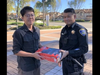 Officer Archie Chu returns a stolen package.
