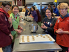 Dublin High School and California School for the Deaf students participate in a catering class.