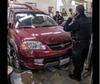 A car drove into Bay Photo Lab.