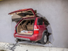 A car drove into Bay Photo Lab.