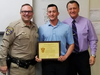 CHP Cpt. Chris Sherry (left) Kristopher Gallinatti (center) and Assistant Chief Jim Nellis are shown at a recognition ceremony for Gallinatti's efforts.