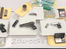 Drugs, guns and cash were found in a home in the 100 block of Maple Avenue, police said.