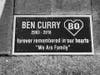 A memorial plaque in downtown Danville honors Ben. The insignia represents his basketball jersey number, 30, and initials, B.C.