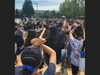 Protesters take a knee in Pleasanton.