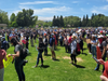 Protesters gather in Pleasanton's Amador Valley Community Park.