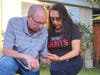 Alicia Garces and Ron Huntington of San Ramon's St. Joan of Arc Church pray in the wake of George Floyd's death.