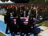 Sgt. Damon Gutzwiller's casket is carried to the stage at a memorial service in his memory.