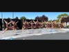 Dancers perform in the Livermore School of Dance parking lot.