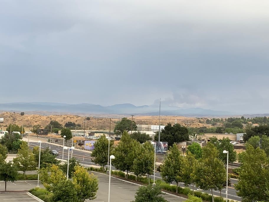 A smoke cloud hung above the Santa Clarita Valley Thursday morning.