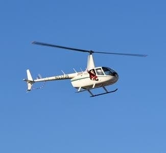 Santa Claus arrives by helicoper at the Village Center in Leesburg during the 2017 Christmas celebration.