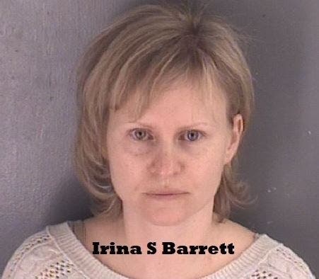 Irina S. Barrett was charged with animal cruelty after authorities said they removed 70 animals from her property that were suffering from neglect.