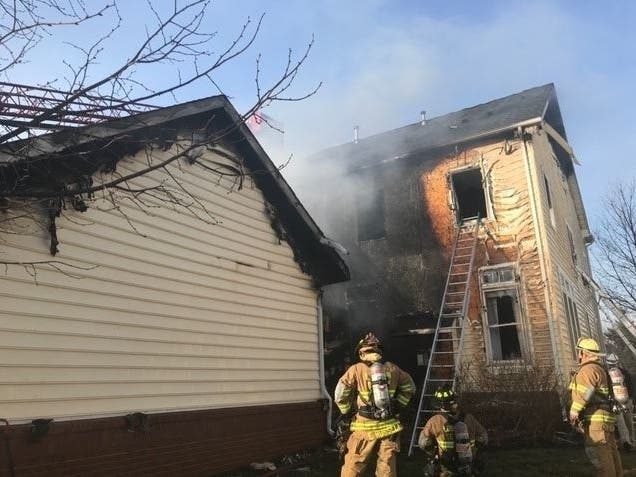 A house fire in the Brambleton area on Sunday displaced four residents and caused damage to neighboring houses.