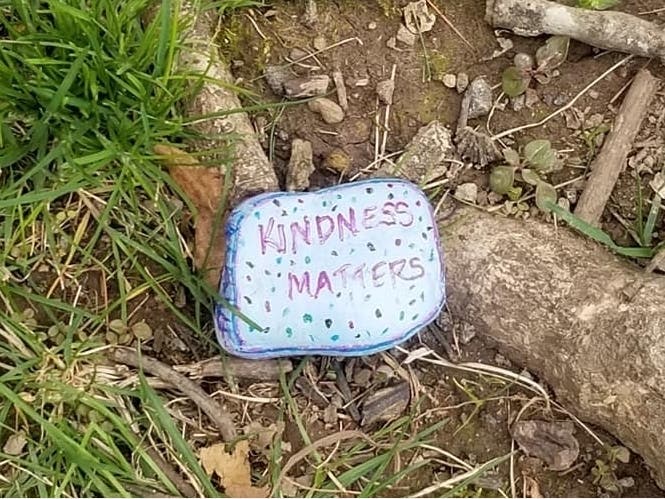Residents are leaving rocks with positive messages along walking trails in the Ashburn Farm area of Loudoun County.