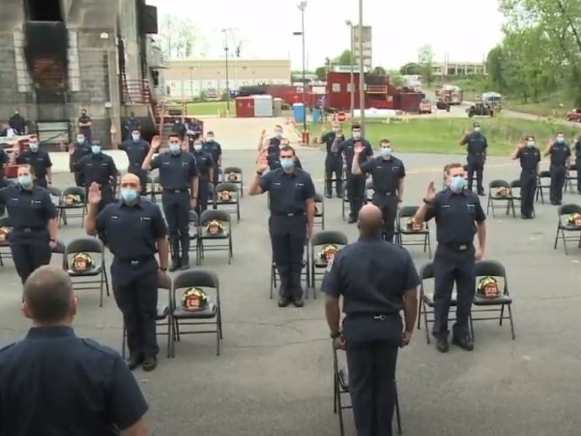 Fairfax County Fire and Rescue's latest recruiting class graduated four weeks early from the fire and rescue academy to assist with the coronavirus crisis.