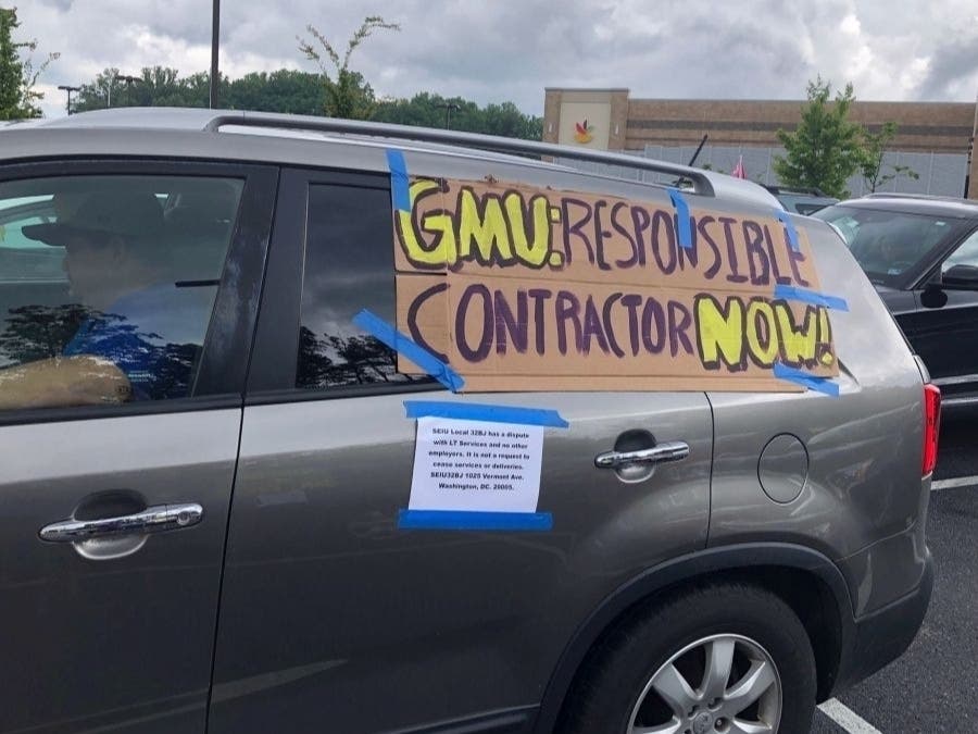 More than 50 cars drove around George Mason University’s Fairfax campus Thursday to demand the university replace its janitorial contractor.