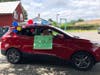 Friends and family members participated in a Father's Day car parade through the campus of the Birmingham Green senior facility in Manassas.