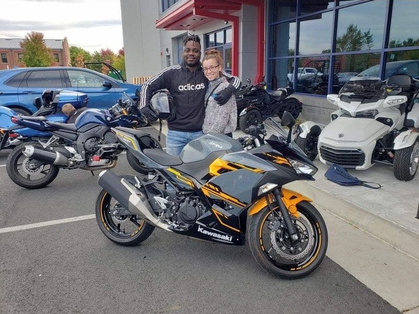 Damion Robinson, with his girlfriend Selena Drincic, on the day he bought his new motorcycle in the fall of 2019.