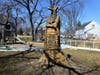 One of chainsaw artist Andrew Mallon’s major works in Arlington is an intricate sculpture in Oak Grove Park near Washington-Liberty High School.