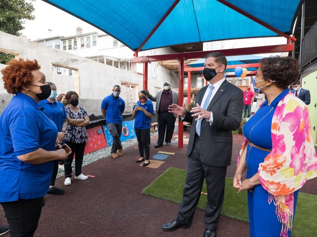 U.S. Labor Secretary Marty Walsh visited the Bright Start Early Care & Preschool in Washington, D.C., on Thursday and met with its founder Marcia St. Hilaire Finn, right.