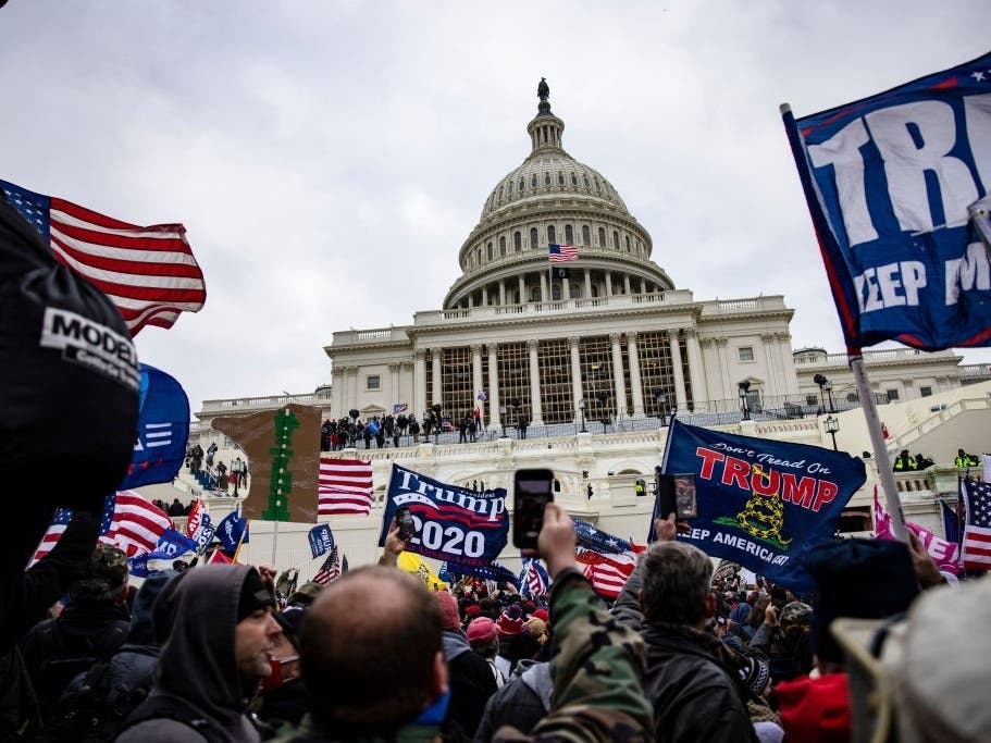 Supporters of now-former President Donald Trump storm the U.S. Capitol on Jan. 6 to prevent the ratification of President-elect Joe Biden's Electoral College victory over Trump in the 2020 election.