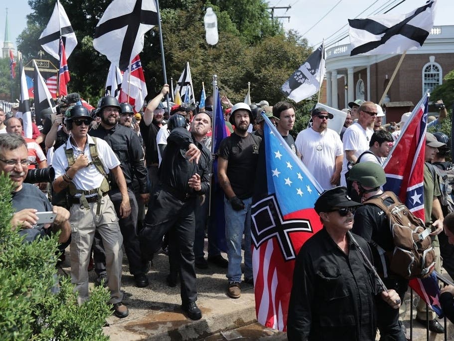 Hundreds of white nationalists, neo-Nazis and KKK members participated in the Unite the Right rally in Charlottesville on Aug. 11-12, 2017. The rally led to a woman's death after she was hit by a car.