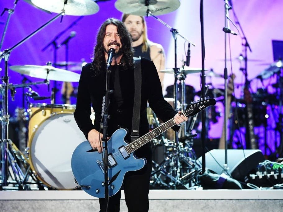 Dave Grohl, Taylor Hawkins and the rest of the members of Foo Fighters will be playing a show at the 9:30 Club to celebrate the venue's reopening after being shuttered for 18 months due to the COVID-19 pandemic.