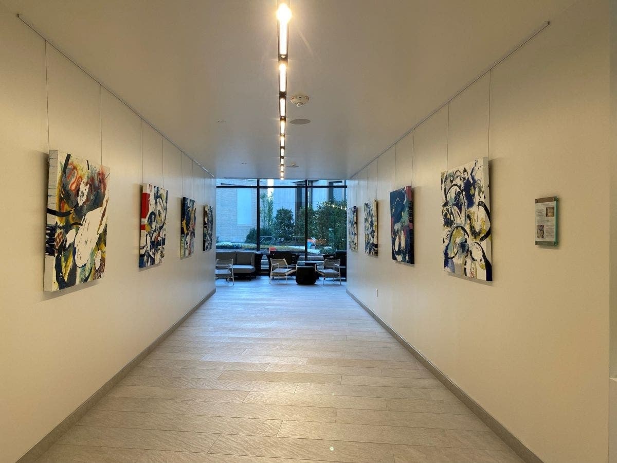 The gallery’s first exhibit is called Moments of Grace, featuring paintings by D.C. artist Anne Marchand. The paintings are inspired by photographs of galaxies and nebulae seen through the Hubble telescope.