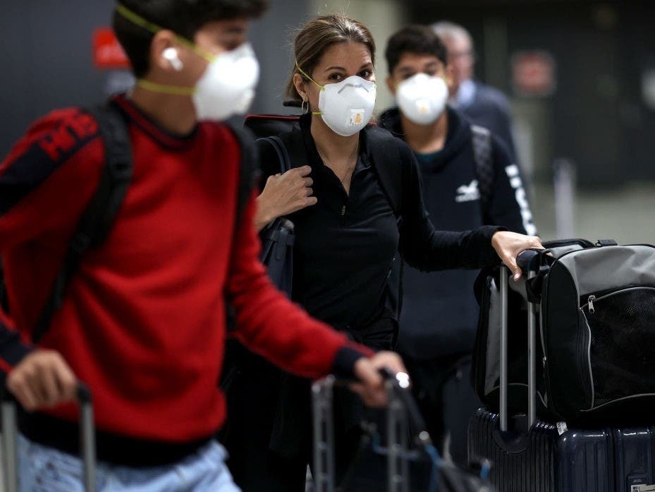 Flight cancellations and delays continued to disrupt holiday travel at the nation’s airports Monday, including at Washington Dulles and Reagan National airports, amid a surge in COVID-19 cases caused by the omicron variant.