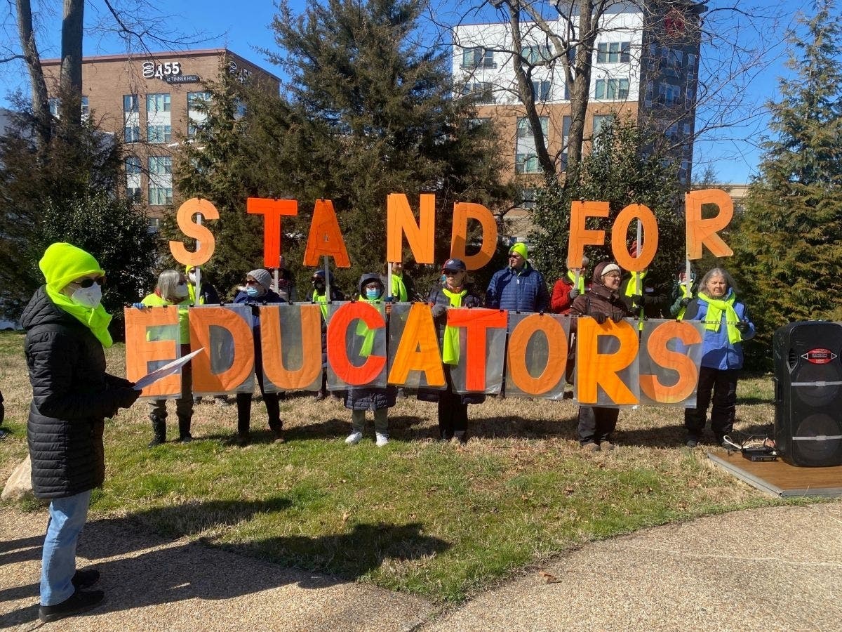 Teachers and students held a rally at the Tinner Hill Historic Park in Falls Church Sunday afternoon to oppose what they called attacks on public education by Virginia Gov. Glenn Youngkin and conservative parents.