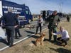 Police Scotland officials visited the Fairfax County Police Department’s driver training range where the FCPD set up a SWAT hostage rescue vehicle, a K-9 patrol and bloodhounds, and explosives ordinance disposal bomb bus.
