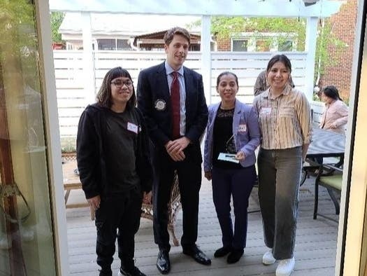 From left, Migel Vergara of Arlington Community High School; Arlington Rotary Club President Tony Weaver;  Heyshell Serrano Valle, Key School 3rd grade teacher; and Dayana Cespedes-Mendoza of Yorktown High School.