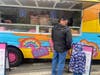 Barbie fans of all ages, including parents and their children, visited the Malibu Barbie Truck on Pentagon Row in Arlington on Saturday to check out the selection of Barbie collectibles.