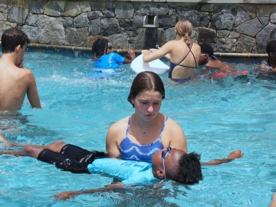 Lindsay Alisbah, a rising junior at Holton-Arms School, launched the WJA Swim Club this summer. Twelve students from the Washington Jesuit Academy, who learned how to float and feel confident in water, will be graduating on Tuesday.