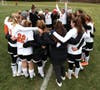 Vermont Academy players celebrate the championship win.