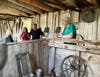 Visitors touring the Piggery at the Heritage Center. 