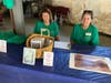 Nancy and Maryann sell Friends of Valley Falls items last season in the red barn. Posters, notecards and t-shirts will be sold June 8. 
