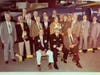JOHN BUSTAMANTE said: "My {great-grandfather} is the one holding the yellow envelope, picture dated October 19,1982. Restoration team, F-11F-1. 